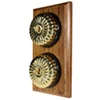 2 Fluted Polished Brass Dome Switches on Vertical Wooden Pattress